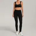 Black two-piece yoga set featuring a sports bra and leggings with ankle button details. - S / Top And Bottom / Solid Black