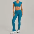 Two-piece teal brushed yoga set with short sleeve crop top and flared leggings - S / Top And Bottom / Sea Blue