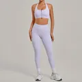 Two-piece lavender yoga set featuring zippered halter sports bra and high-waist leggings - S / Top And Bottom / Romantic Purple