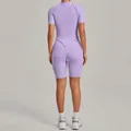 Back view of a professional purple high-waisted yoga bodysuit with short sleeves for women - Lavender