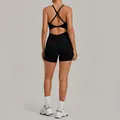 Professional back view of black one piece yoga bodysuit with adjustable cross straps - S / Top And Bottom / Black