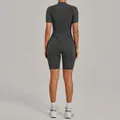 Back view of high-performance dark grey short sleeve one-piece yoga jumpsuit for women - Charcoal Gray