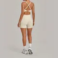 Beige cross-back yoga romper with adjustable straps and butt-lifting design - Beige