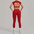 Red 2-piece yoga set featuring open-back short sleeve top and high-waisted leggings - S / Top And Bottom / Ruby Red