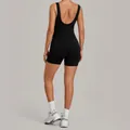 Zwarte yoga jumpsuit met U-hals en open rug, achteraanzicht voor sport en fitness - Zwart