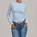 Light blue tight fitting long sleeve yoga top for high impact fitness and pilates - Sky Blue