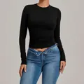Women's black slim fit tummy control long sleeve yoga top for high intensity workouts - Black