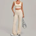 Creamy beige two-piece yoga set with sports bra and flared cross-waist leggings - Cream Apricot