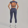 Professional back view of a grey-blue two-piece yoga set with backless top and leggings - Granite Blue