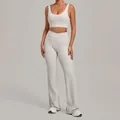 Professional off-white yoga set featuring a sports bra and flared leggings for gym - Warm Stone Grey