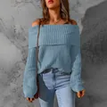 Close-up of elegant blue off-shoulder knit sweater with high-quality ribbed texture details. - Light Blue