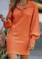 Close-up detail of a bright orange knit sweater dress featuring lapel and lantern sleeves - Orange