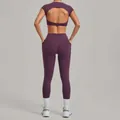 Women's purple two-piece gym yoga set featuring open back crop top and leggings - Grape Purple