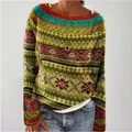 Detailed view of colorful ethnic pattern on a women's relaxed fit round neck knit sweater. - S / Tops / Multicolor