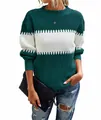Close-up detail of a women's green and white color-block knitted sweater with lantern sleeves - Green