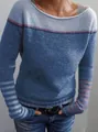 Close-up of a blue color block knitted sweater featuring striped sleeve details - 3XL / Tops / Blue