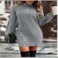 Outdoor lifestyle shot of a grey turtleneck knitted sweater dress with ribbed texture. - S / Tops / Gray