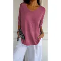Casual slim-fit women's V-neck knit top with 3/4 sleeves in a solid mauve pink color. - S / Tops / Rouge Red