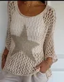 Detail shot of women's beige crochet knit top featuring a large sequined star pattern. - S / Tops / Apricot