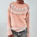 Detailed view of women's peach knit sweater with grey and white jacquard diamond pattern - Orange-Red Diamond Pattern