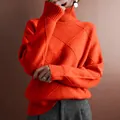 Vibrant orange women's turtleneck sweater featuring a classic argyle knit pattern and loose fit - Orange Red