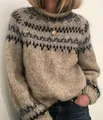 Detailed shot of an oversized Fair Isle knit sweater with chunky wool texture in beige - S / Tops / Gray