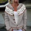 Close-up of a women's gray knit cardigan with white and orange geometric patterns. - S / Tops / Gray Bear Paw(9073)