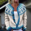 Close-up detail of a cozy blue and white Fair Isle knit cardigan with rustic wooden buttons. - 4XL / Tops / Cream Jacquard