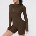 Dettaglio della tuta da yoga marrone a maniche lunghe con cerniera per fitness e danza - Taglia S / Top E Pantaloni / Caffè