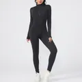 Detailed view of women's black long sleeve zippered one-piece yoga jumpsuit for fitness - S / Top And Bottom / Black