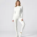 Detail of white long-sleeve fleece-lined yoga jumpsuit for winter sports fitness gear. - S / Top And Bottom / White