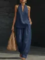 Detailaufnahme eines dunkelblauen Halter-Tops und passender Leinenhose - Dunkelblau