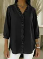 Close-up of women's black faux denim V-neck shirt featuring elegant ruffle trim. - S / Tops / Black