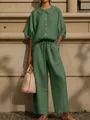 Detail of green women's cotton linen set with lantern sleeves and drawstring pants - Green