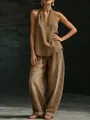 Full view of a vintage tan denim set with halter top and matching wide-leg trousers. - Khaki