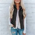 Close-up detail of women's warm fuzzy fleece vest with functional zipper and high neck - 3XL / Tops / Black
