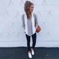 Comfortable white fuzzy sherpa vest with zipper and pockets worn in a casual lifestyle setting - 3XL / Tops / White