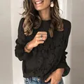Close-up detail of women's black hollow lace top with elegant bell sleeves - 3XL / Tops / Black