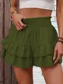 Detailed view of women's olive green tiered ruffle skort with high smocked elastic waist - S / Bottoms / Army Green