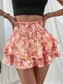 Chique mini-skort met bloemenprint, gesmockte hoge taille en ruches voor dames - Oranje