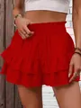 Close-up of red high-waisted tiered culottes with elastic ruffled waistband for summer - S / Bottoms / Red