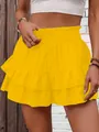 Detail view of women's bright yellow tiered ruffled skort with high elastic waist design - S / Bottoms / Yellow