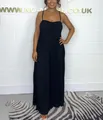 Elegant black pleated spaghetti strap jumpsuit for women featuring a wide-leg cut and flowy fit - S / Top And Bottom / Black