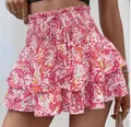 Close-up showing the pink floral tiered skort with high smocked elastic waistband and drawstring - S / Bottoms / Pink