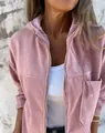 Dettaglio di una giacca rosa in velluto a coste con cappuccio e chiusura a zip. - Taglia S / Top / Rosa