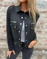 Detailed shot of black suede jacket featuring gold buttons and metal zippers. - S / Tops / Black