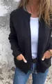 Vista detallada de una chaqueta de punto negra casual para mujer con cremallera - S / Tops / Negro