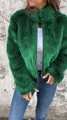 Close-up detail of a vibrant green faux fur jacket for women featuring a silver zipper - S / Tops / Green