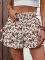 Close-up detail showing the vintage floral print and ruffled layers on a high-waisted skort - S / Bottoms / Apricot Print