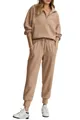 Two-piece ribbed half-zip sweatshirt and jogger lounge set in tan displayed on model - Khaki
